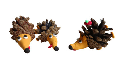 Creative DIY craft school autumn project featuring hedgehogs made from pine cones and air dry clay