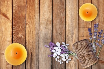 Homemade herbal lavender candles on desk