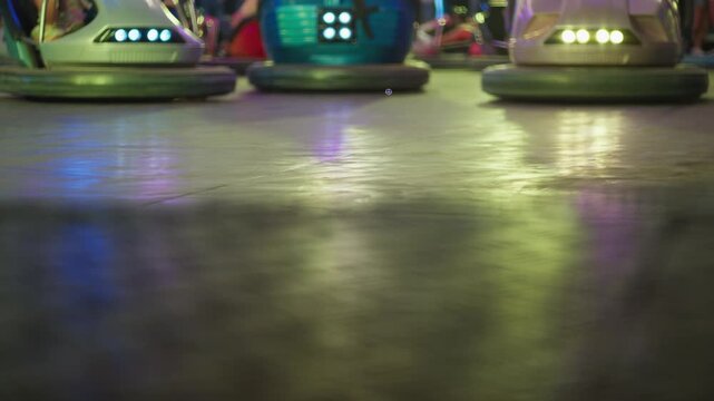 Electric Bumper Car Ride at Night in an Amusement Park