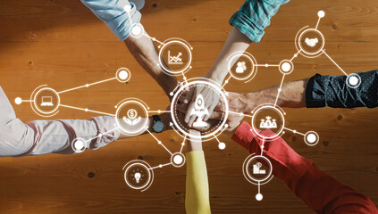 Collaborative Hands Overlaid with Digital Icons Representing Growth, Innovation, and Technology in a Modern Work Environment. Amity