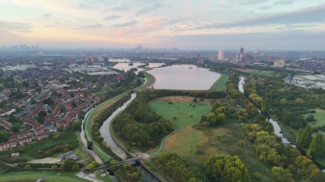 A morning drone aerial view of the network of reservoirs in Edmonton, London, and the Lea River navigation waterway.