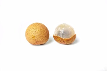 Fototapeta premium Fresh longan fruit with pieces of peeled and unpeeled fruit. Isolated on white background with copy space. Tropical Asian fruit. Suitable for editing and used for food and agriculture advertising.