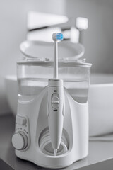 A home water flosser for teeth and oral care. Concept: a convenient and effective tool for...