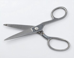 Pair of metal scissors on white background
