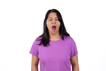 Fototapeta premium woman in purple T-shirt yawning on white background