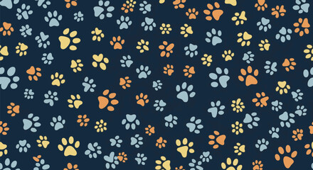 A cheerful and playful pattern featuring a scattered arrangement of colorful paw prints on a dark blue background