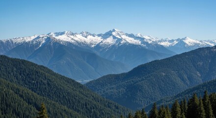 Fototapeta premium Mountain range panorama. Vast, snow-capped peaks. Lush green valleys. Clear blue sky