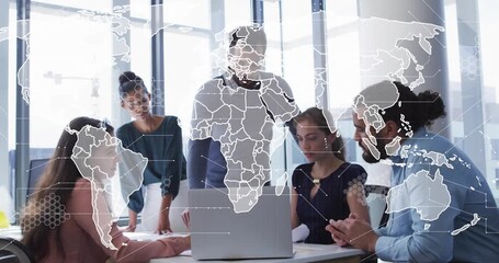 Tech team pointing at laptop in modern office, map graphic fading in data clusters guiding analysis - Powered by Adobe