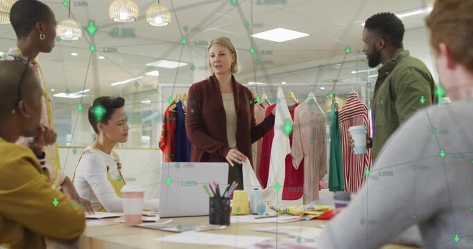 Female presenter holding garment starting design meeting, displaying data overlays emphasizing seam