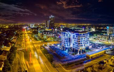 aerial view Gaborone CBD central, city skyline at night, bustling central business district