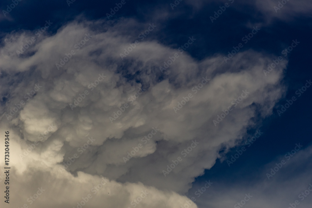 Canvas Prints clouds in the blue sky before a thunderstorm. toned.