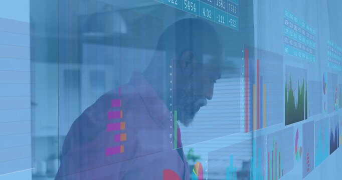 Transparent dashboard appearing triggers man leaning and analyzing bar charts for financial insight