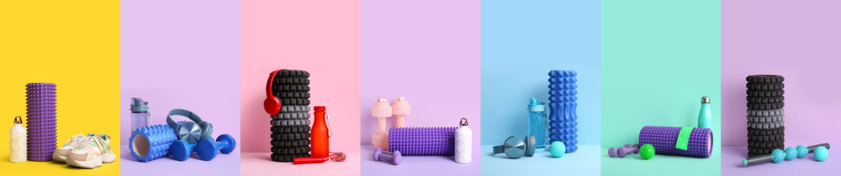 Set of sports equipment with foam rollers on color background