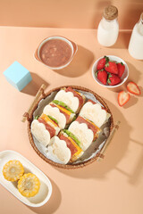 Adorable Bear Face Sandwiches in Picnic Basket with Fresh Strawberries and Milk - Cute Kids Lunch Food Photography