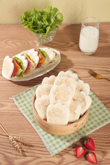 Cute Bear Paw Steamed Buns with Sandwich and Milk Healthy Breakfast Set on Wooden Table
