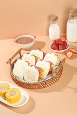Adorable Bear Face Sandwich Buns with Fresh Strawberries and Milk Bottles on Peach Background