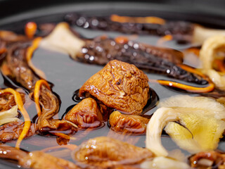 Premium Dried Mushrooms Grilling on Hot Pan - Gourmet Cooking Ingredients for Soup and Asian Cuisine