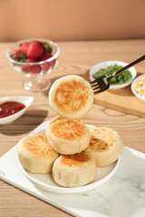 Chinese Pork Mooncakes with Crispy Golden Crust and Meat Filling Traditional Asian Pastry