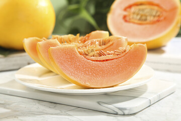 Fresh Cantaloupe Melon Slices on White Plate - Sweet Orange Summer Fruit