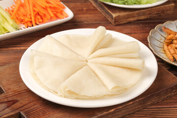 Handmade Flour Tortillas with Fresh Vegetables on Rustic Wooden Table - Traditional Mexican Food Preparation