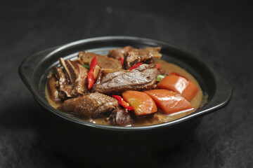 Braised Duck and Turnip Stew in Iron Skillet - Traditional Farmhouse Comfort Food Dish
