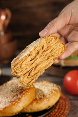 Traditional Chinese Sesame Layer Cake Slice with Golden Swirled Pastry Layers Beijing Style Dessert