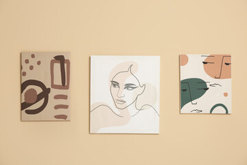 Beautiful paintings on beige wall