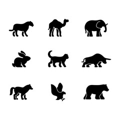 Obraz premium Collection of nine distinct animal silhouette icons, including a camel, elephant, rabbit, cat, bull, horse, squirrel, and bear, presented on a white background