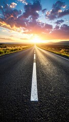 Fototapeta premium Empty Asphalt Road Stretching to the Horizon with Golden Sunset and Cloudy Sky in a Rural Landscape with cinematic tone