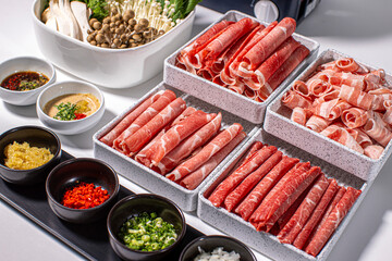 Shabu-shabu with vividly/clearly photographed meat. 