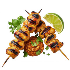Grilled chicken skewers with peanut sauce and lime isolated on a transparent background image