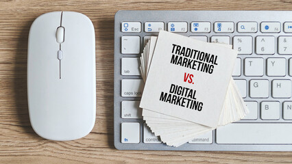 Traditional Marketing Versus Digital Marketing Concept Written on Paper with Computer Keyboard and...