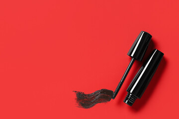 Black mascara with sample on red background