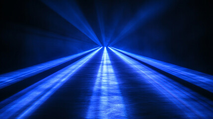 Rays of blue laser beam lights shining on a black background symbolizing energy technology power futuristic vision and dynamic illumination in an abstract style.