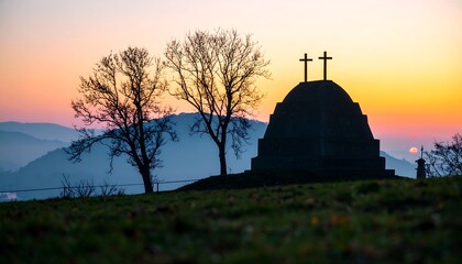 Silhouetted monument at sunrise