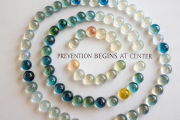 Transparent Marbles Forming a Spiral Inward Design