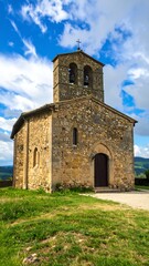 Fototapeta premium Stone church under a partly cloudy sky
