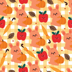 seamless pattern cute cartoon bunny with autumn element drawing in checkered background style
