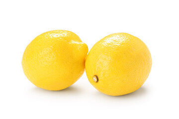 Fresh ripe lemons on white background