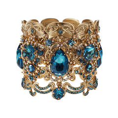 Ornate gold cuff with teal gems