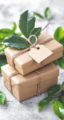 Stacked gifts with leaves & twine. Earthy and eco-friendly