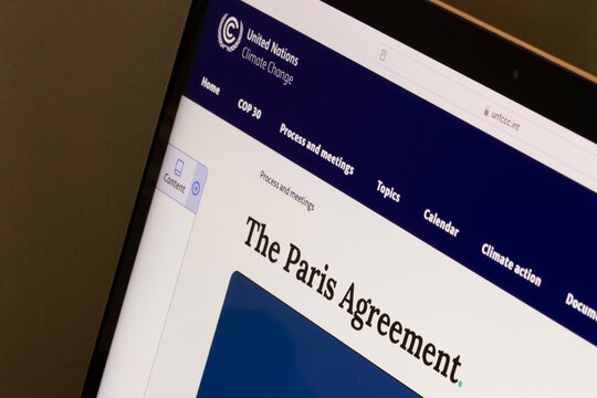 Portland, OR, USA - Sep 29, 2025: Webpage of the Paris Agreement, a legally binding international treaty on climate change, is seen on the United Nations Framework Convention on Climate Change website