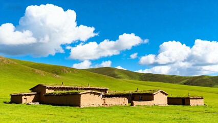 Obraz premium Rural mud houses on green hills