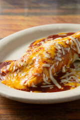 A closeup view of an enchilada.