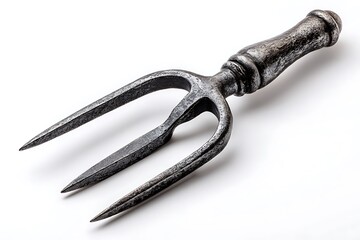 Obraz premium Antique metal pitchfork adds rustic charm to your design projects, creating an earthy and vintage vibe for agricultural or Halloween themed designs