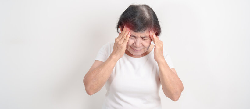 Elderly Woman having headache and Dizzy for concepts of Chronic Stress, Headache and Migraine, World Brain Tumor day, Brain Cancer, Brain Stroke, Dementia, alzheimer, Hypotension and mental health - Powered by Adobe