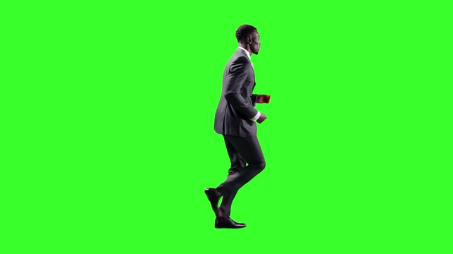 A young businessman in a dark suit runs energetically in a seamless loop seen from behind against a chroma key green background, suitable for corporate success videos, motivation themes, career growth - Powered by Adobe