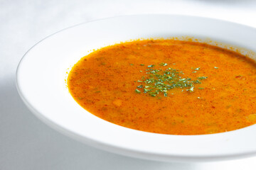 A view of a bowl of lentil soup.
