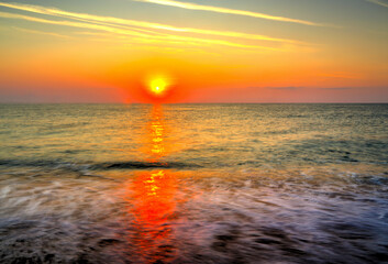 Beautiful summer sunrise over the beach