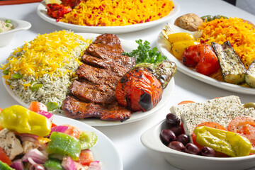 A view of a a variety of Middle Eastern entrees.